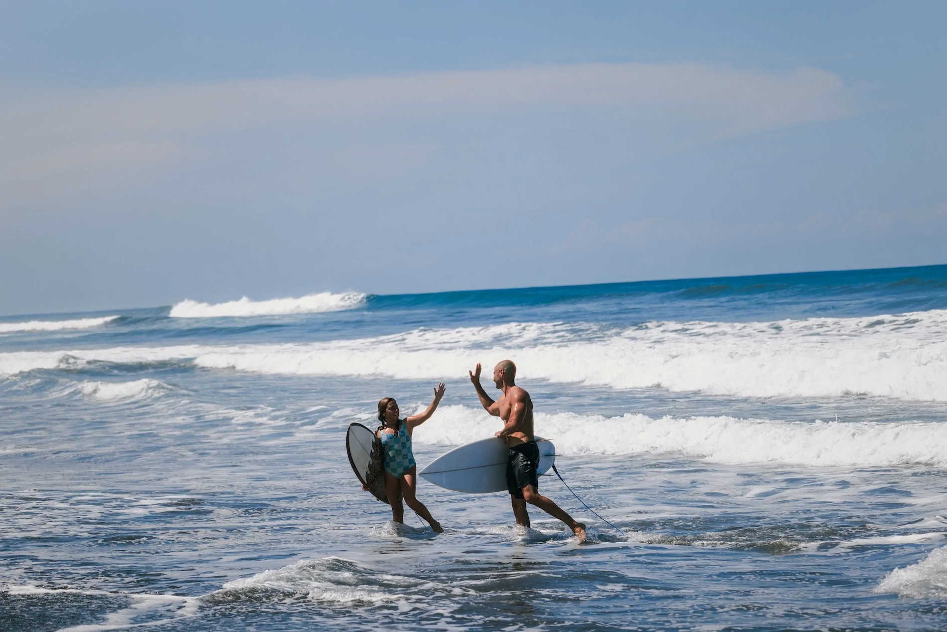Surfers at the Beach near Amarena Beach Hotel